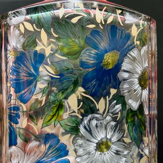 Bottiglia in vetro decorata con tappo sferico