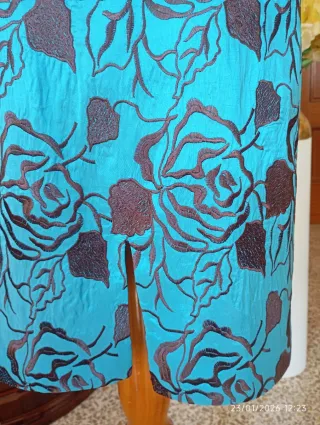 Traje ceremonia azul y marrón