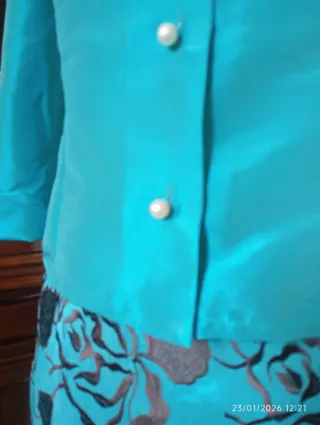 Traje ceremonia azul y marrón