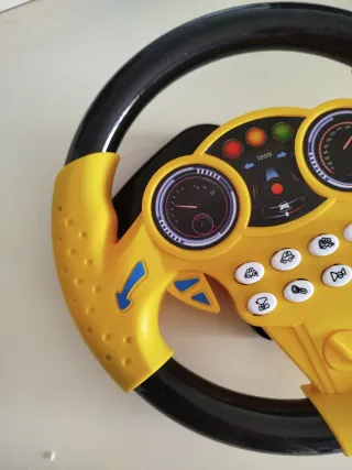 Volante de juguete amarillo y negro