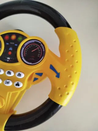 Volante de juguete amarillo y negro