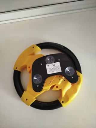 Volante de juguete amarillo y negro