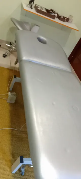 Camilla elèctrica para masaje, dos cuerpos.