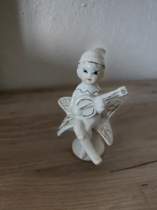 Figura porcelana antigua músico