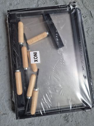 Barbacoa de metal con chimenea