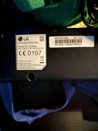 Barra de sonido LG con subwoofer y mando distancia