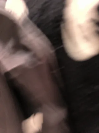 Top negro de manga larga con fruncido