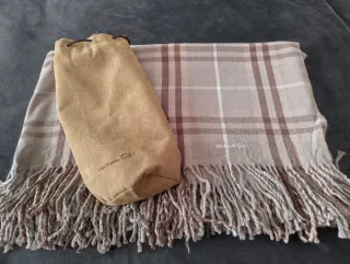 Manta de viaje con funda.