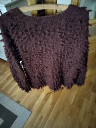 Chaqueta de lana marrón con flecos