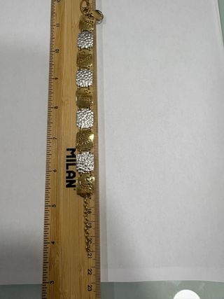Pulsera de oro y plata