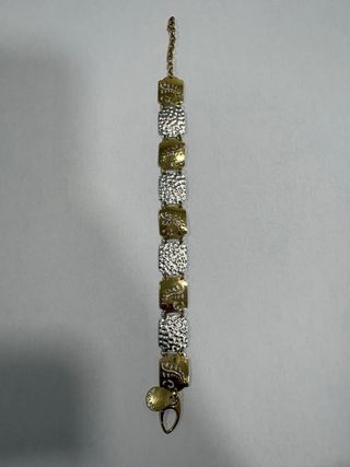 Pulsera de oro y plata