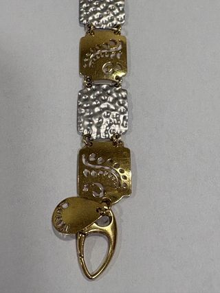 Pulsera de oro y plata