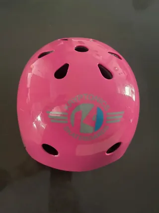 Casco rosa bicicleta, patinaje niña