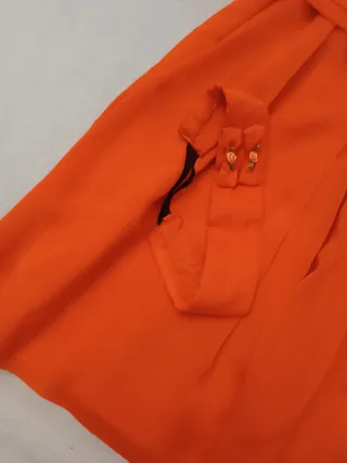 Vestido infantil naranja con lorzas