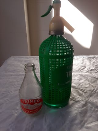 Sifón y botella trineo.