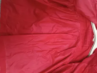 Chaqueta impermeable roja niña El Corte Inglés