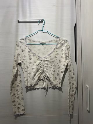 Top floral manga larga mujer