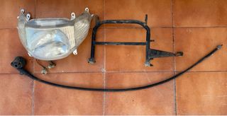 Caballete, cable cuentakm y faro Kymco Movie XL