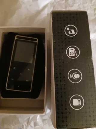 Reproductor MP3 Negro y Dorado