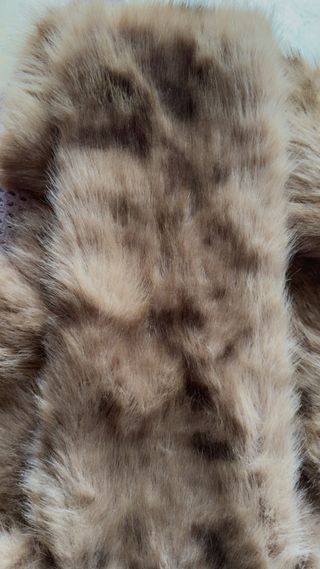 Chaqueta de pelo moteada marrón y gris