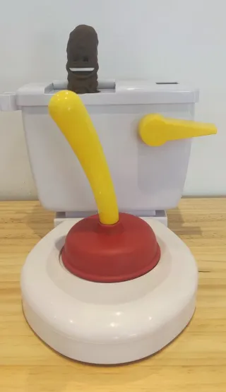 Juego Atrapa la Caca (Baño Boom)