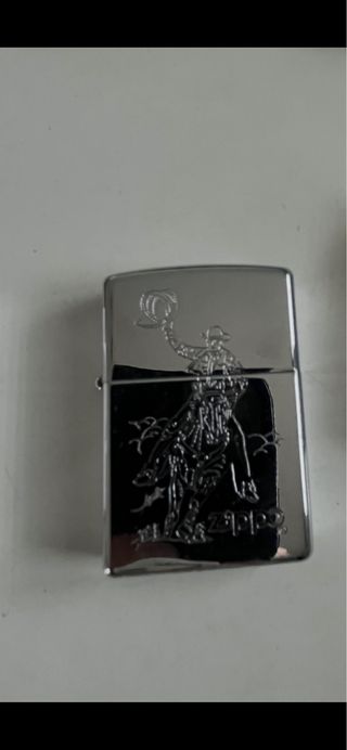 Zippo con grabado de vaquero