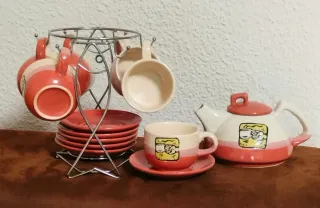 Juego de té/café cerámica con soporte metálico.