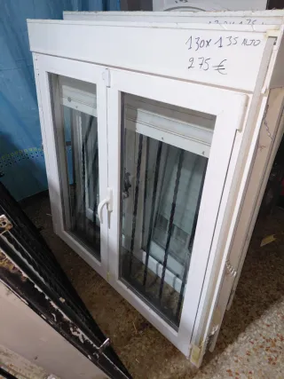 2 Ventanas con rejas 130x135