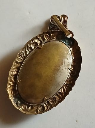 Ciondolo con uccellino e fiore