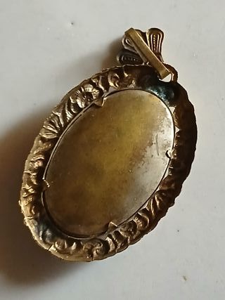 Ciondolo con uccellino e fiore