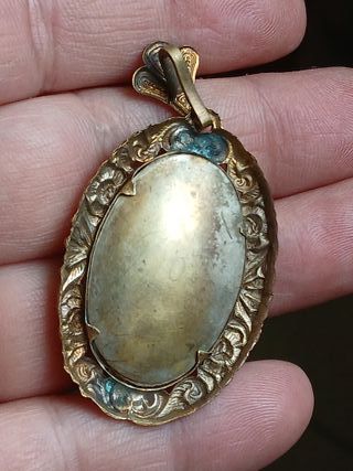 Ciondolo con uccellino e fiore