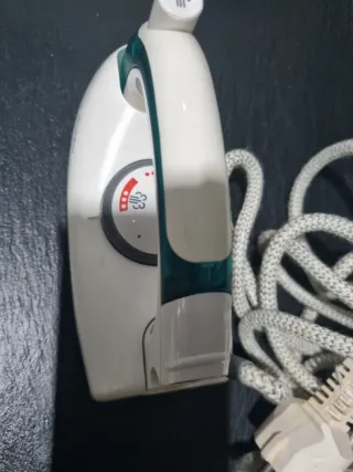 Plancha de viaje con vapor