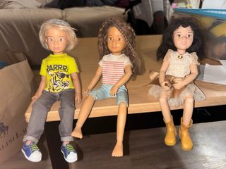 Casita de muñecas con tobogán y columpio