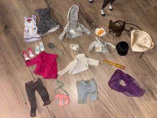 Casita de muñecas con tobogán y columpio