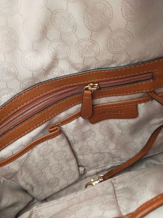 Conjunto Michael Kors marrón y dorados