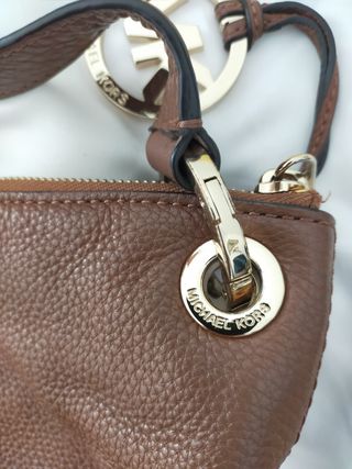 Conjunto Michael Kors marrón y dorados