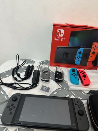 Nintendo Switch con Accesorios / Negociable