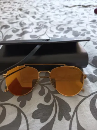 Gafas de sol Montblanc doradas lentes espejo