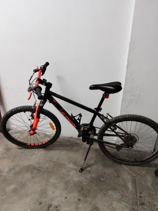 Bicicleta Montaña Negra y Naranja