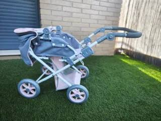 Carrito de muñecas gris y rosa