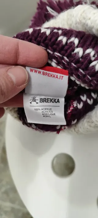 Cappello invernale pompon beige e viola