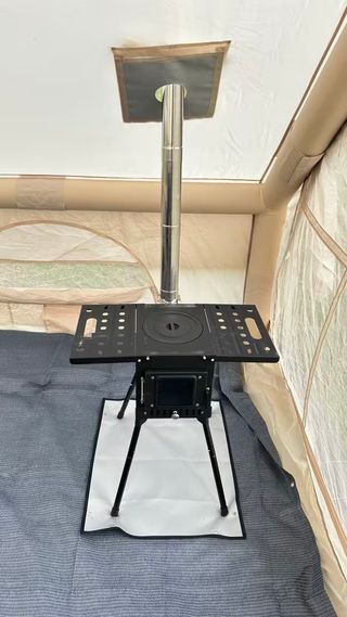 Estufa de leña portátil de acero con chimenea