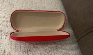 Gafas de sol aviador doradas y fundas