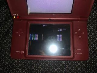 Pacchetto 2x Nintendo DSi XL (Verde e Rosso) - Riparazione
