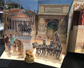 Roma un libro en 3D.