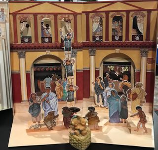 Roma un libro en 3D.