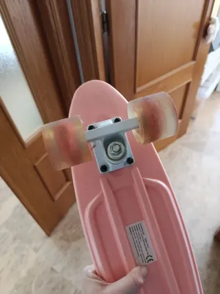 Monopatín rosa