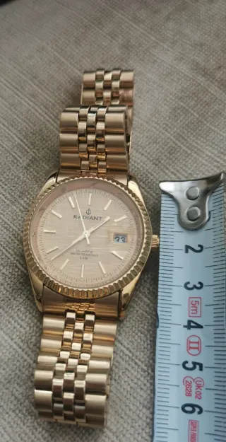 Reloj Radiant Dorado Unisex.