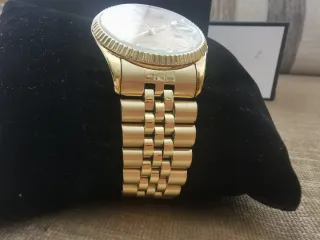 Reloj Radiant Dorado Unisex.