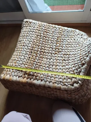 Poltrona dondolo in vimini con foglie di palma